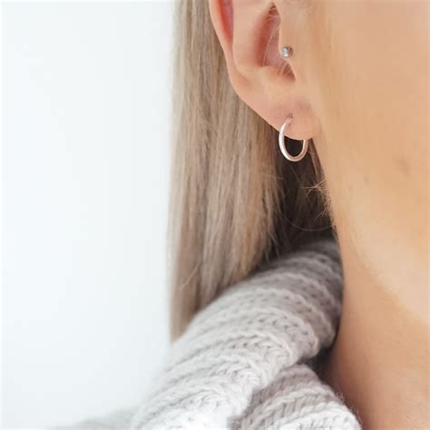 very small silver hoop earrings